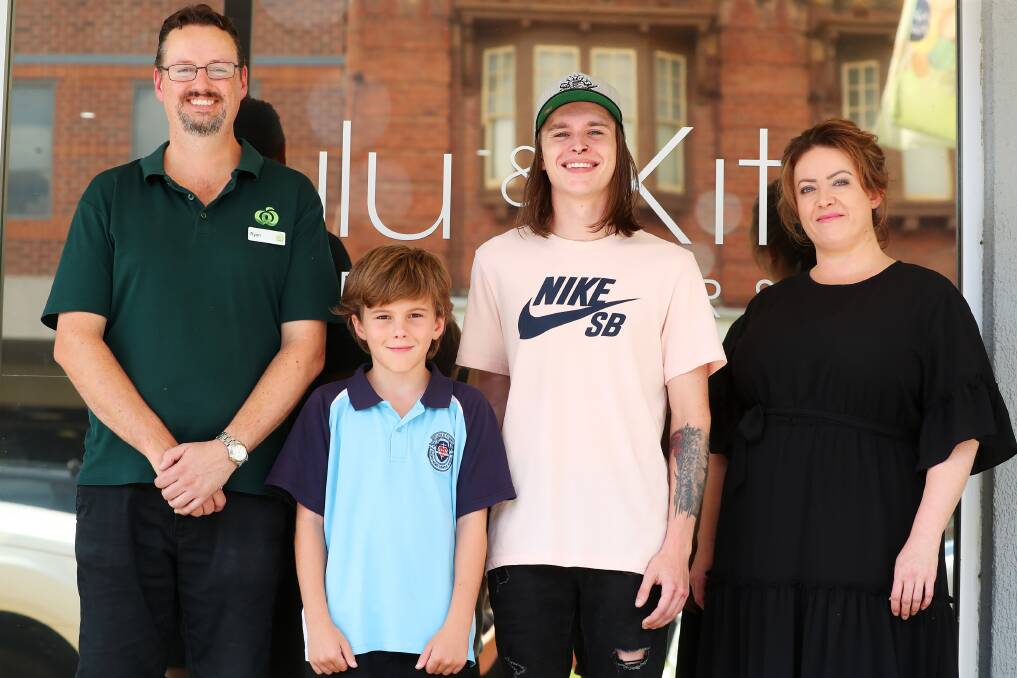 TEAM EFFORT: Woolworths' Ryan Sytton, 12-year-old Brock Wotton, support worker Damian Doyle and Lulu and Kit's Kirsty Quach will make a difference together. Picture: Emma Hillier