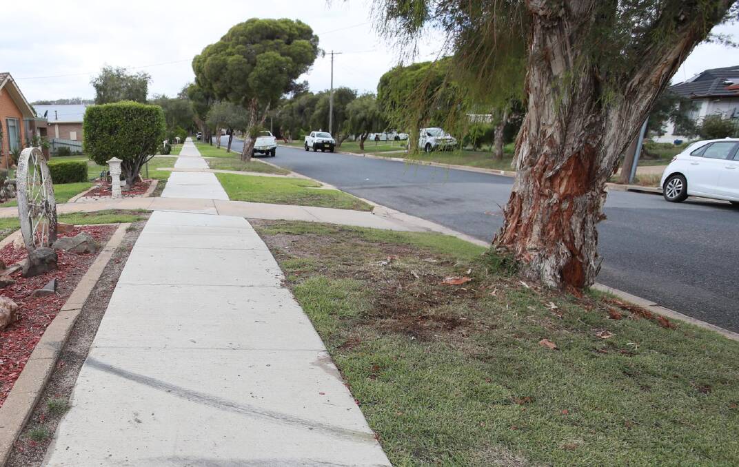 Tyre marks can be seen on the footpath outside a Raye Street home. Picture: Les Smith