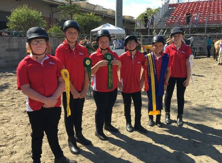 WINNERS ARE GRINNERS: Lillian, Julie-May, Natasha, Charlie, Jacinta and Zoey show off their ribbons. Picture: Supplied