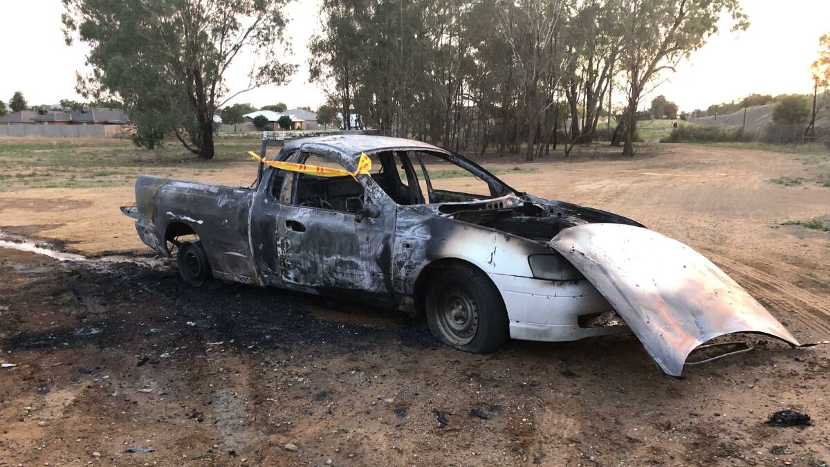 Firefighters extinguished a Ford ute on fire early Monday morning. Picture: Jessica McLaughlin