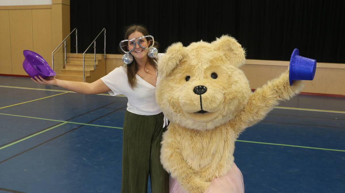 GRIZZLY MOVES: Hit 93.1 morning host Herbie with Dougal the Cancer Council Mascot demonstrated their best disco dances. Picture: Jessica McLaughlin