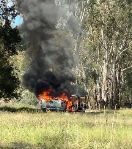 The vehicle was completely alight when firefighters reached the scene on Sunday afternoon. Picture: Contributed