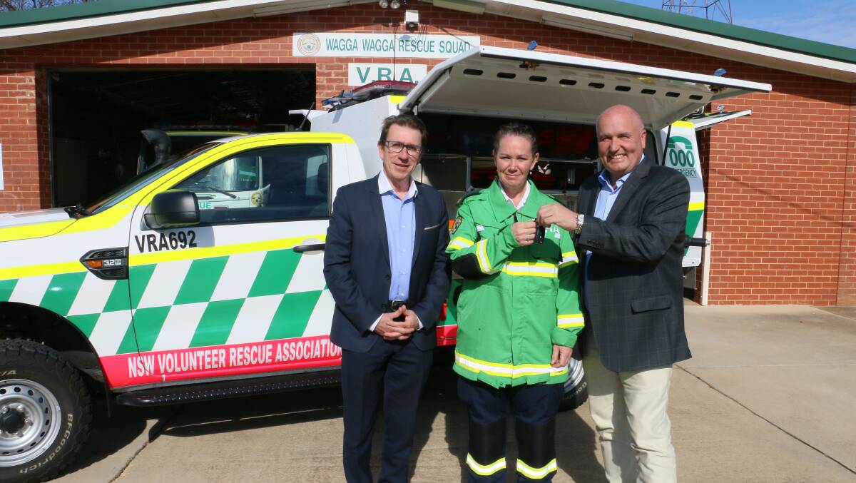 FRESH WHEELS: Wagga MP Joe McGirr helped hand over the keys to a new rescue truck with Minister David Elliott to Wagga VRA captain Jodie Carter. Picture: Jessica McLaughlin