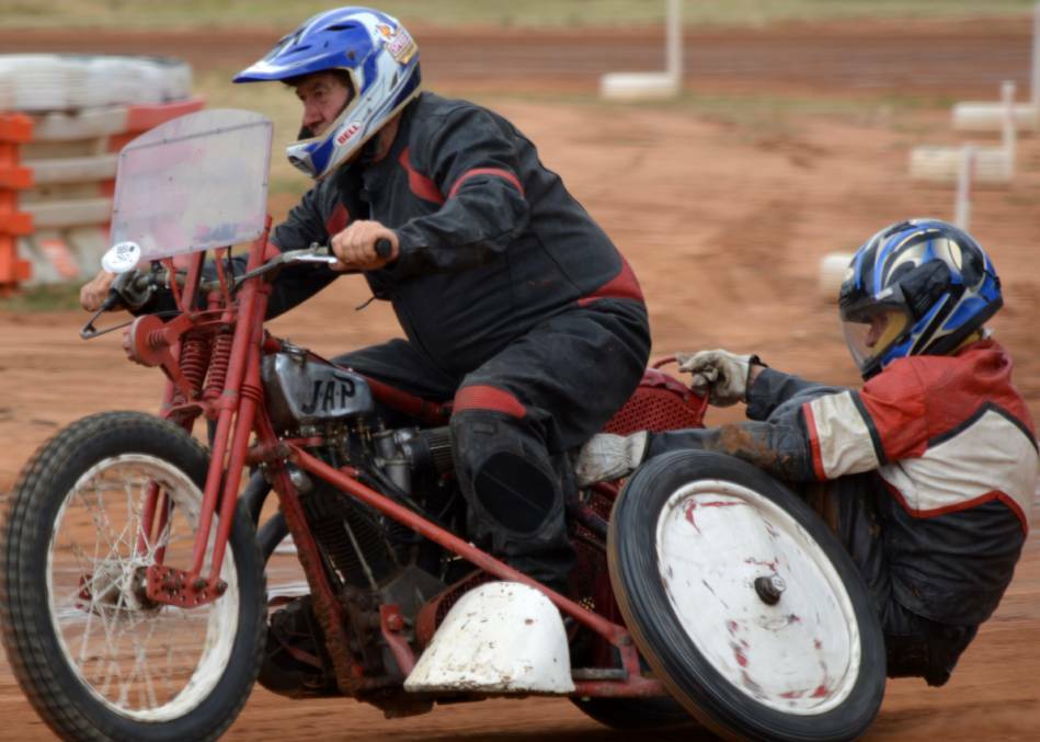 NEED FOR SPEED: Kerry Phelan and Joe Belling demonstrating the Trounson JAP Sidecar outfit at a past speedway meeting. Picture: supplied