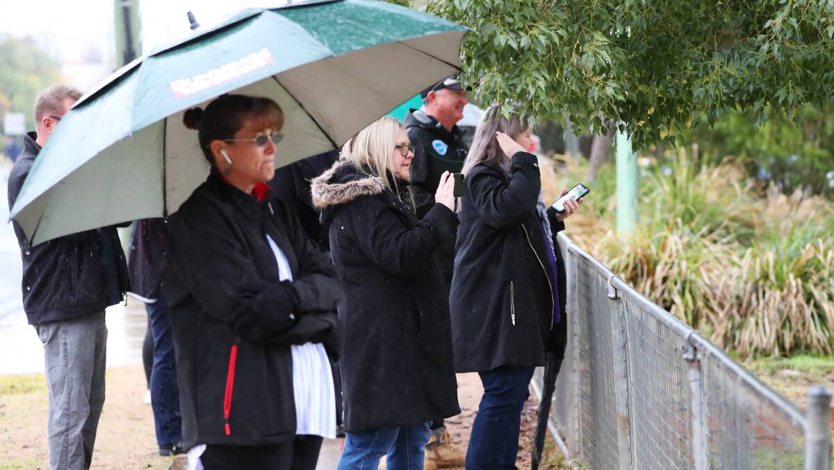 Parents cheered on their students in an effort to see Rod Whelan reinstated as principal. Picture: Emma Hillier