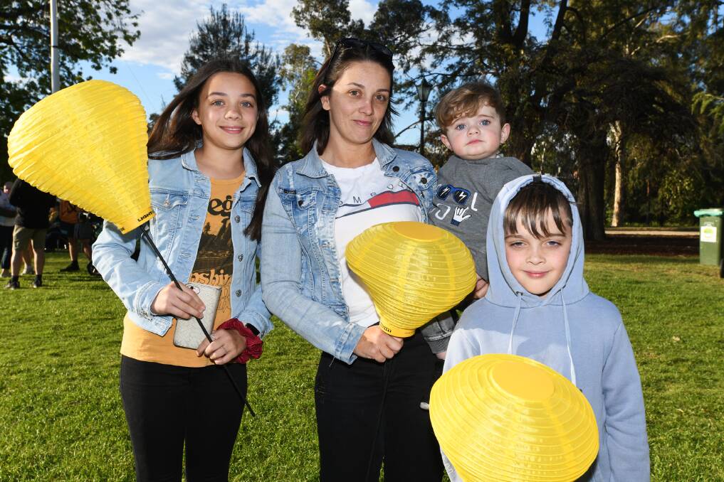 FAMILY BOND: Zita Hayes, Liza Boyle, Noah Black, 1, and Taten Hillsey, 8, stand together as a family to shine a light on blood cancer.