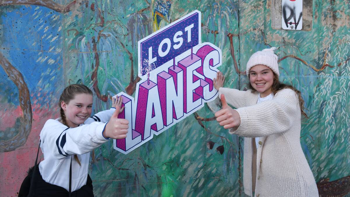 THROWBACK: Christine Quick, 12, and Elsie Russell, 12, enjoy last year's Lost Lanes festival.