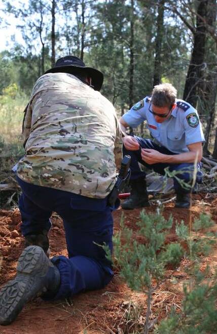 Adrian Telfer assists with the search for Allecha Boyd's remains in Lester State Forest. Picture: NSW Police Force