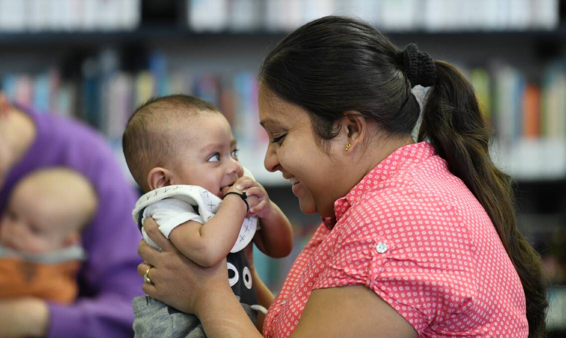 Himaya Jayasinghe with 5-month-old Aaron Jayasinghe.
