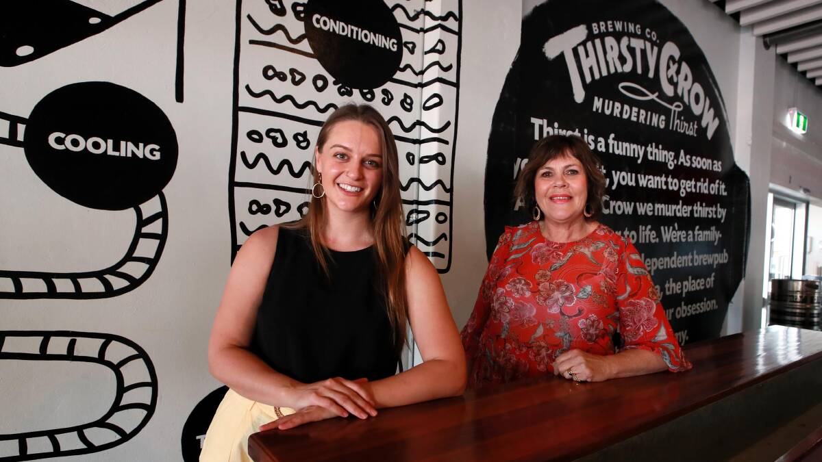 LUNCH IS SERVED: The Thirsty Crow's Katie Galvin and Carevan's Jeanette Lloyd are thrilled to have each other's support in tough times. Picture: Les Smith