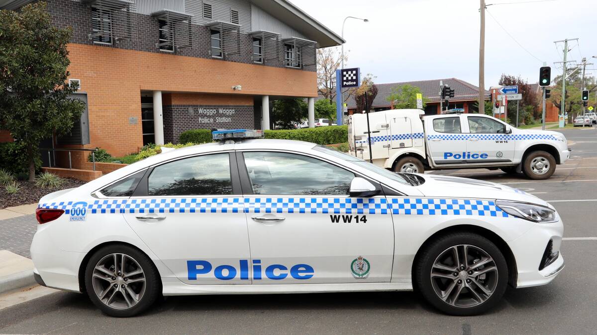 Man charged for allegedly peering into Wagga home, punching officer