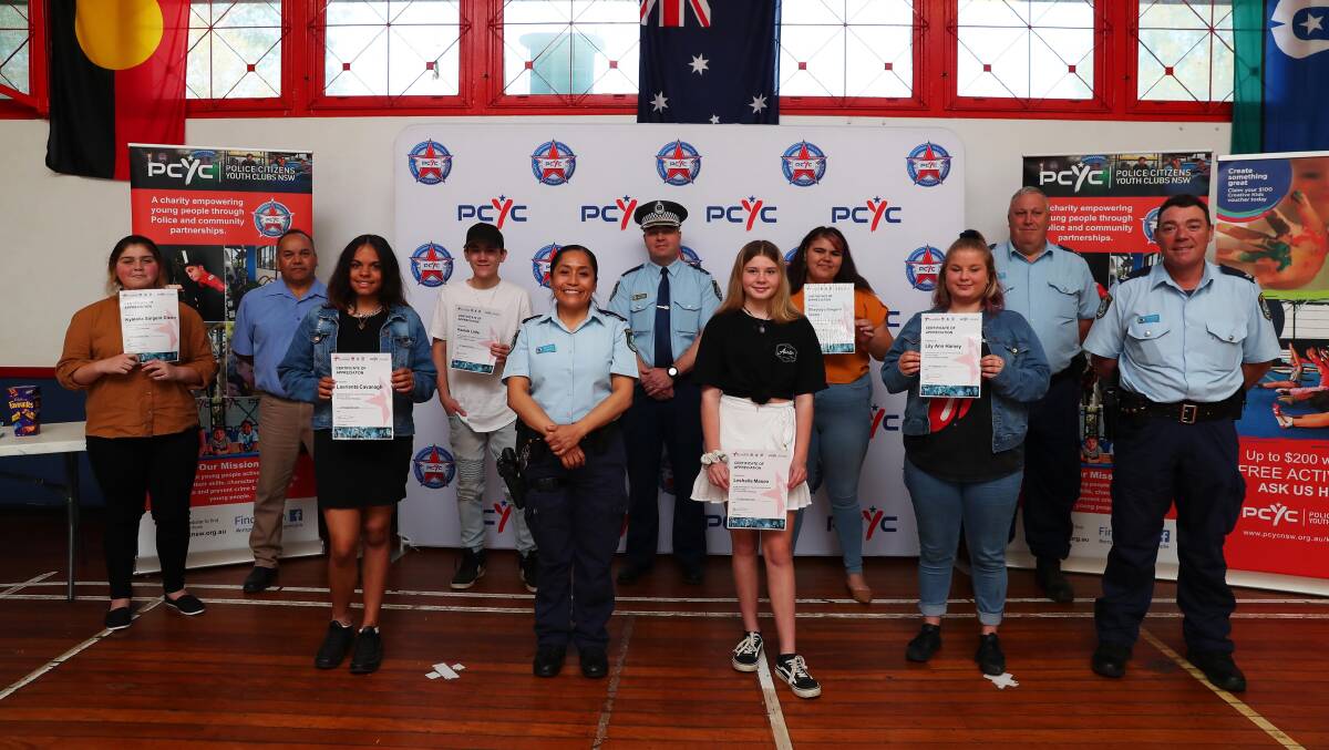 Wagga Police and PCYC staff congratulate the six young participants on their accomplishments. Picture: Emma Hillier