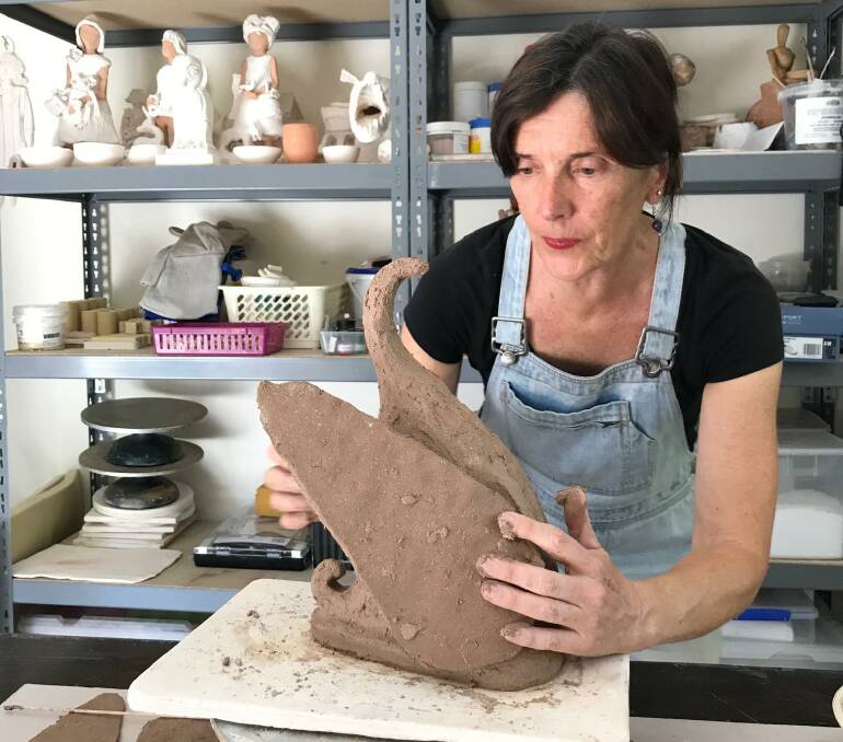 Ceramics artist Amanda Bromfield creates a black swan piece for entry into this years Wynne Prize at the Art Gallery of NSW. Picture: Contributed