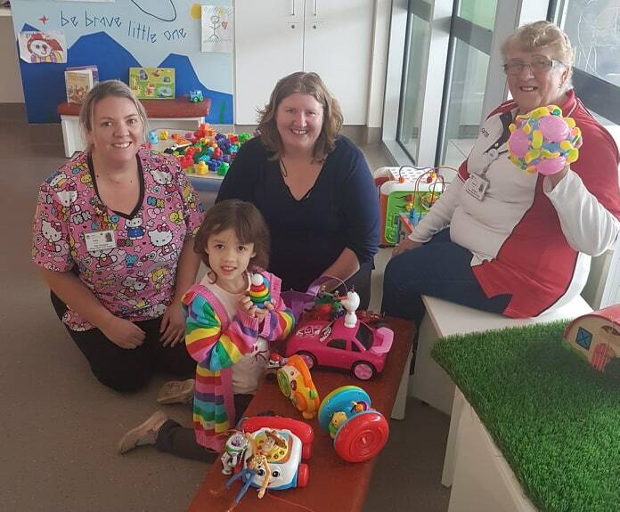 GENEROSITY: Saphiere donates her toys to Play Therapist Kelly Murray, alongside her mum Nadine Bowman and great-grandmother Brenda Shone. Picture: Supplied