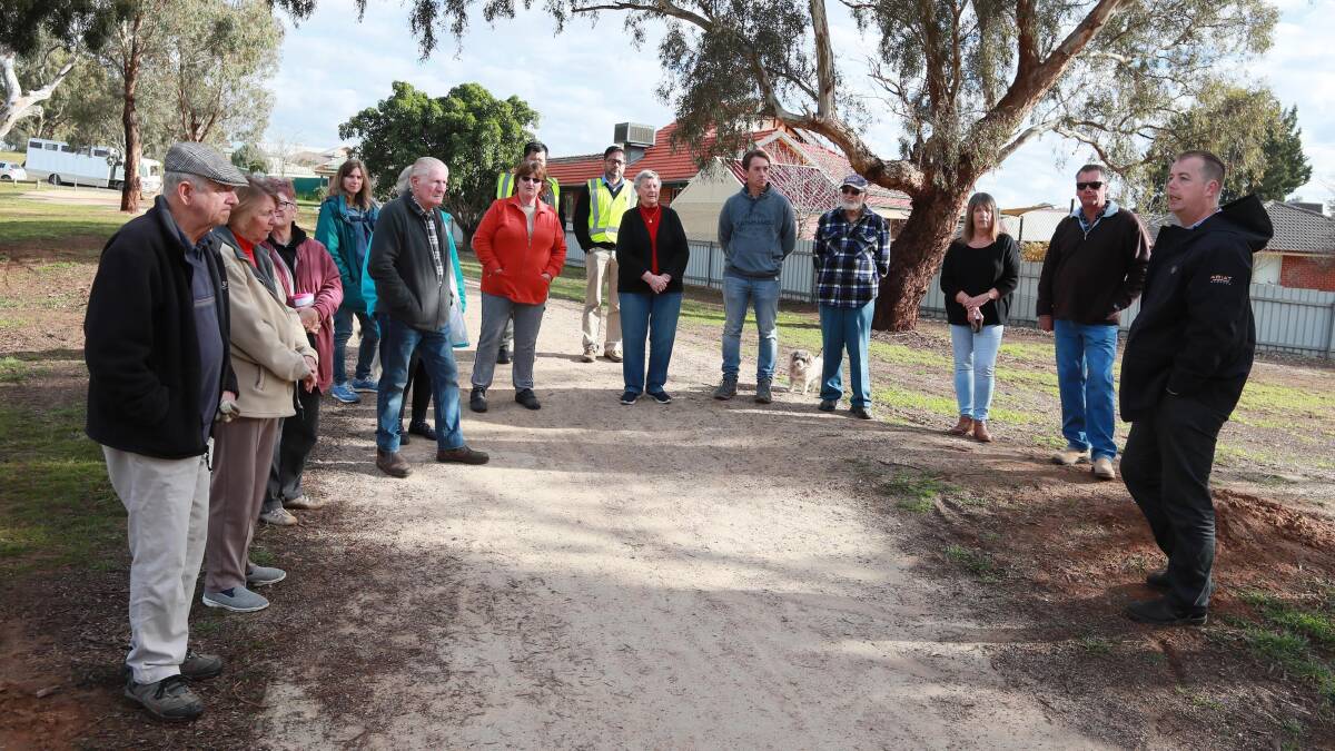 DISCUSSION: Council's Ben Creighton addresses Estella residents concerns over the new bike path upgrade. Picture: Les Smith