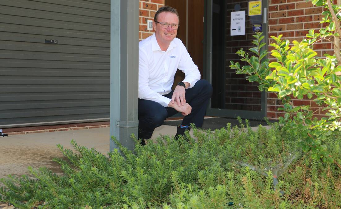 GARDEN CARE: Andrew Crakanthorp helps explain how to save water around the home and yard. Picture: Jessica McLaughlin