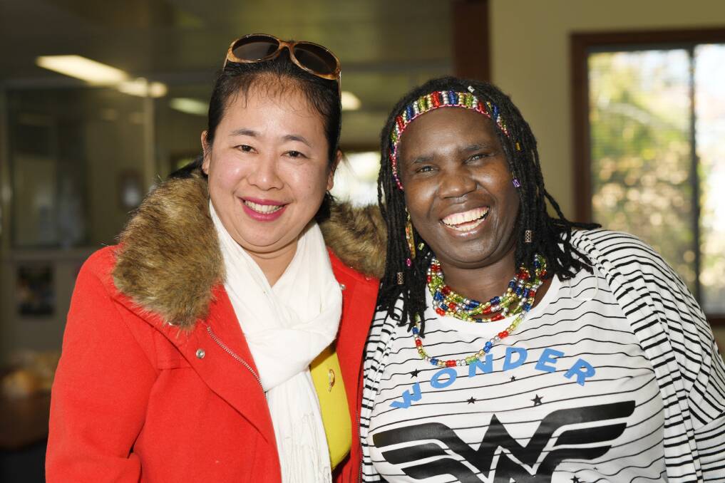 CONFIDENCE: Htu San La Bang and Constance Okot say the voting system in Australia gives them confidence for their future.