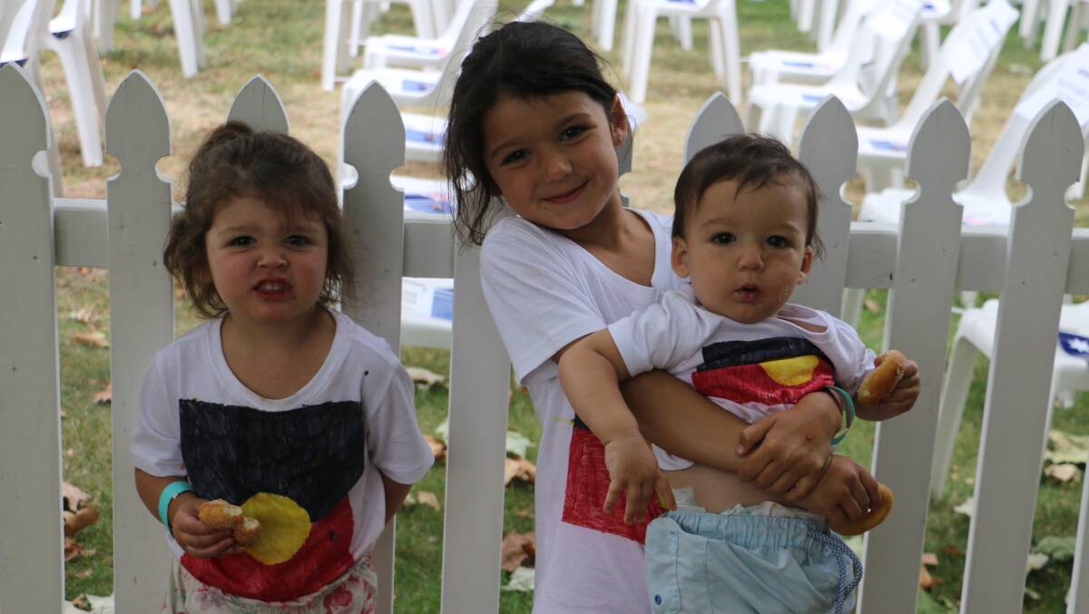 PROUD HISTORY: Myah, Amelia and Benji Pengelly spend the day celebrating what it means to be Australian. Picture: Jessica McLaughlin