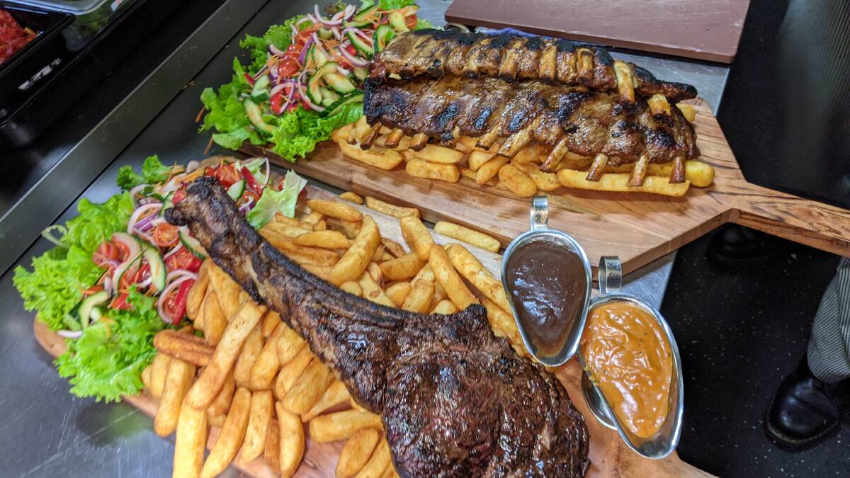 Junee's Commercial Hotel served up a tomahawk steak and kilo of chips as part of The Food Dude series. Picture: Contributed