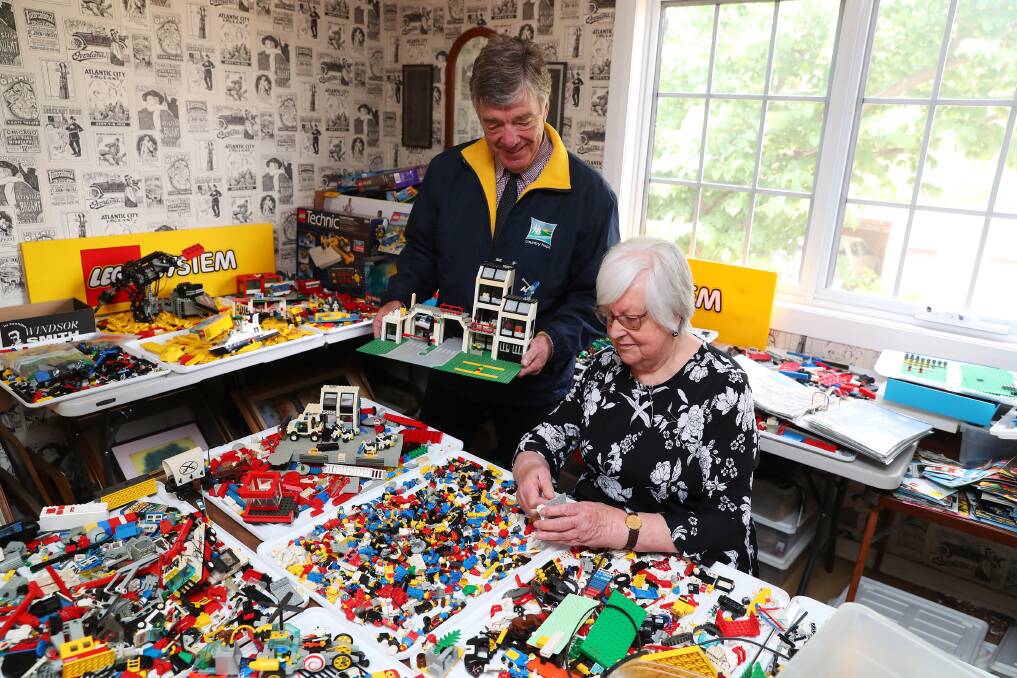 Tom Looney and Robyn Jessiman try their hand at creating a Lego masterpiece. Picture: Emma Hillier