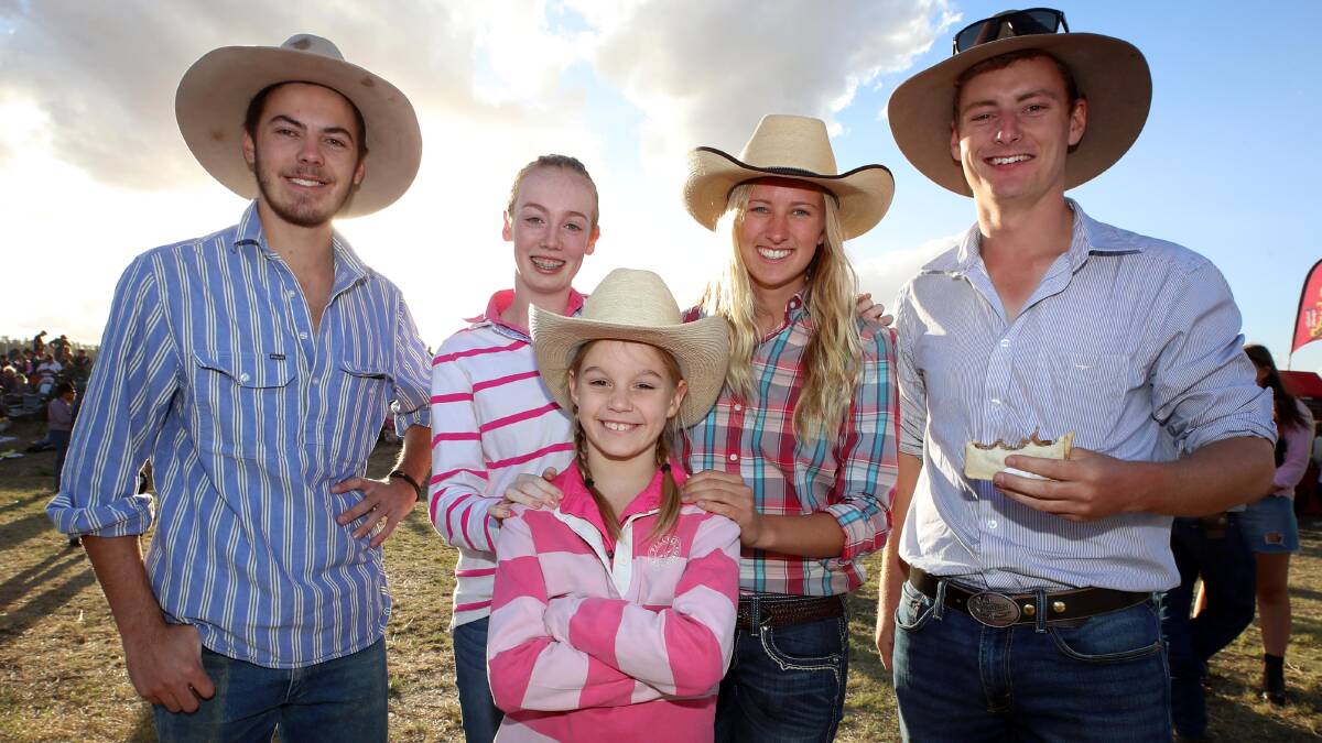 Isabelle Armstrong of Wagga, 10, with (L) Robbie Coe from Henty, Wagga girl Kate Armstrong, Grace Carmichael of Coolamon and Charlie Bergmeier from Lockhardt enjoyed the sunshine.