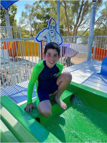 Griffith's 11-year-old Aiden Floriani trying out the racer slide for the first time. Picture: Contributed