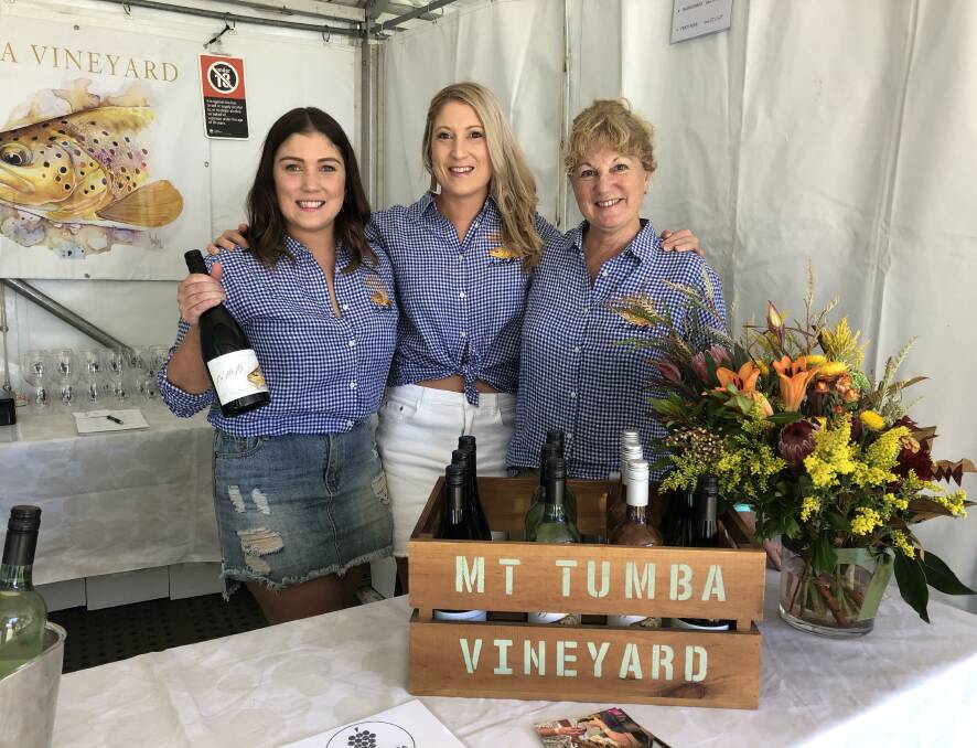 CHALLENGE AHEAD: Briony Cottam, Kaitlin Cottam and Elvie Yates of Mt Tumbarumba Vineyard have a long way to go towards recovery. Picture: Jessica McLaughlin