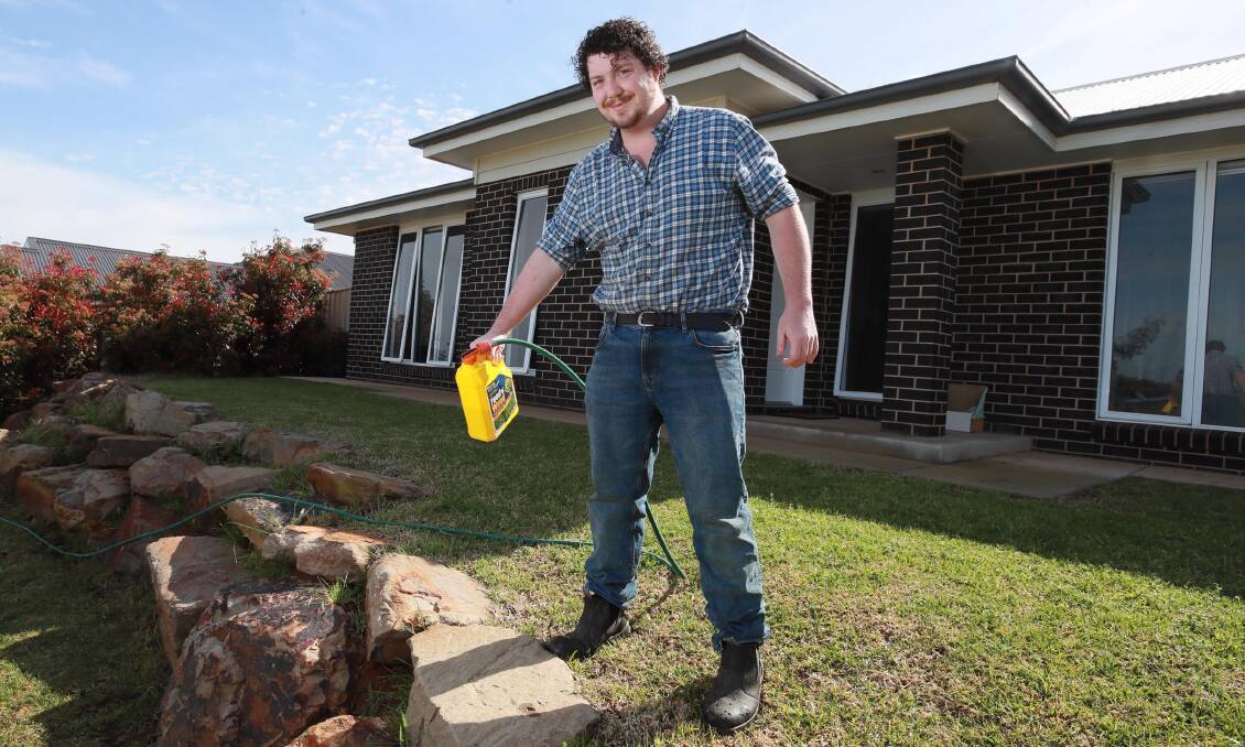 HANDYMAN: Joseph Doherty is prepared to do the jobs that keep getting pushed aside around the house, all in an effort to have a dream wedding. Picture: Les Smith