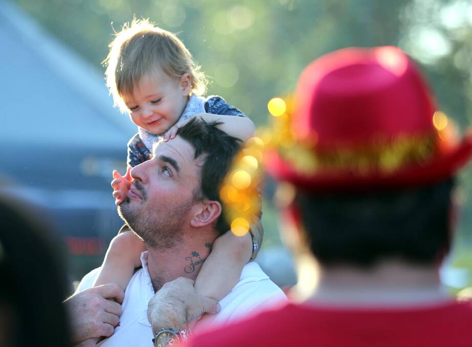 Brett White from Tumbarumba with 16-moth-old son Hudson White at last year's Carols in the Park. Picture: Les Smith