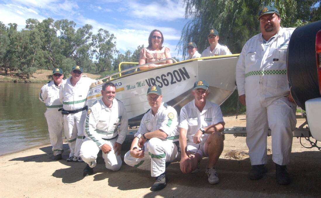 THROWBACK: John Rooke and his rescue crew in 2006 as they commission a new boat.