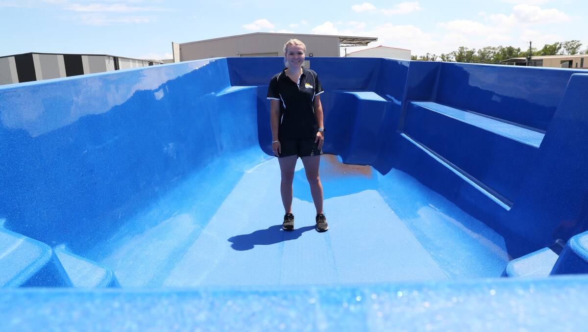 COOL OFF: Wagga Freedom Pools' Alexis Pollard has been run off her feet as customers flock to the store ahead of summer. Picture: Emma Hillier