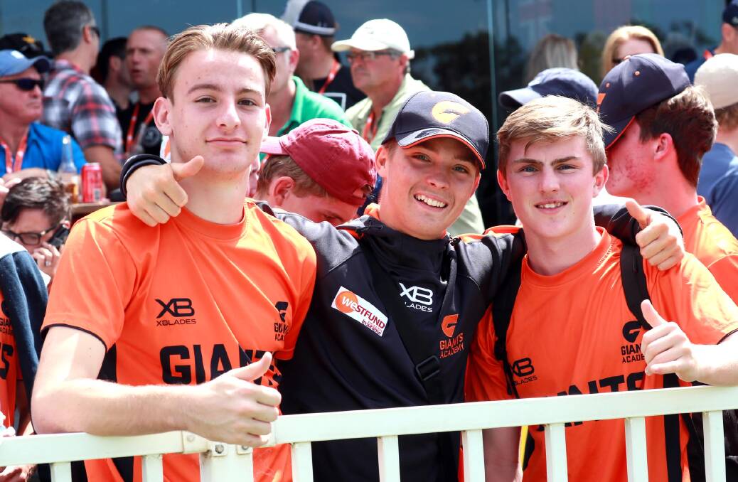 NEXT GENERATION: Giants Under 16s members with Nathan Battaglio, Riley Bradshaw and Jack Rule showing support for their leading team. Picture: Les Smith