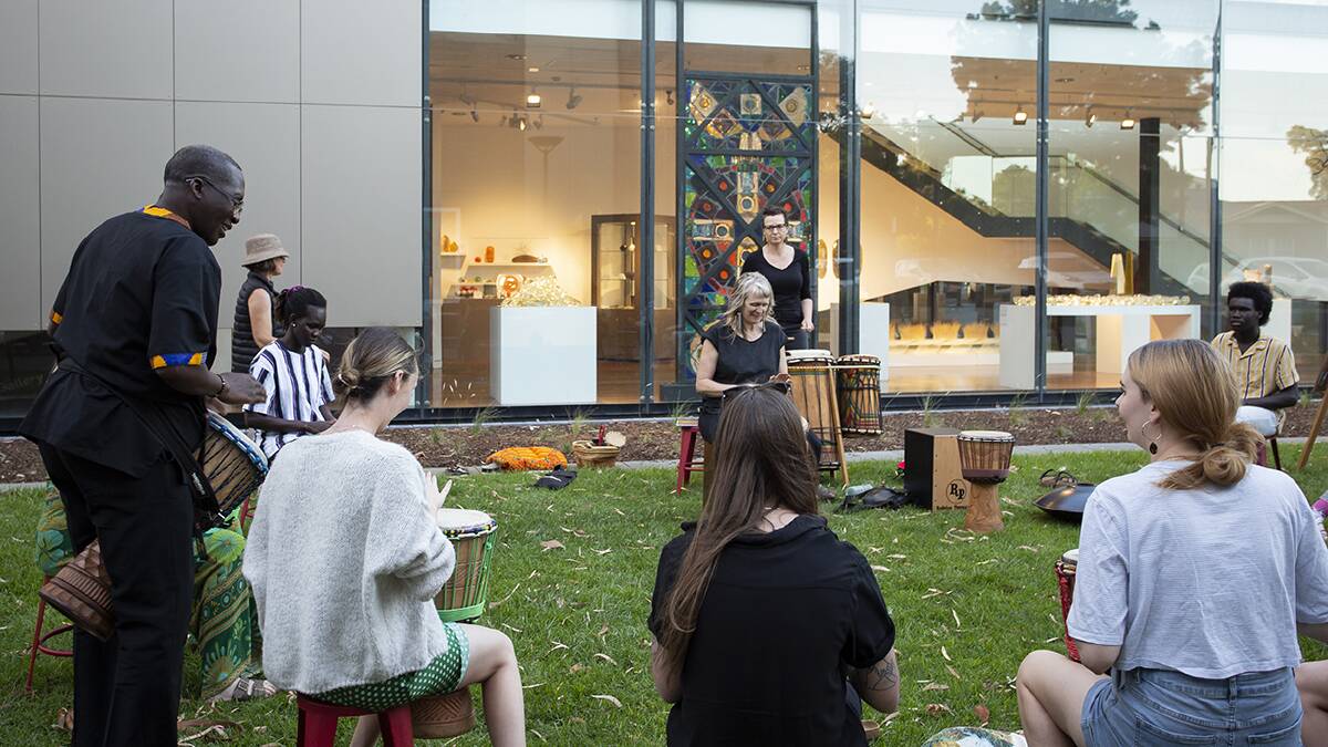 Experience drumming on the lawns. Picture: Wagga Art Gallery