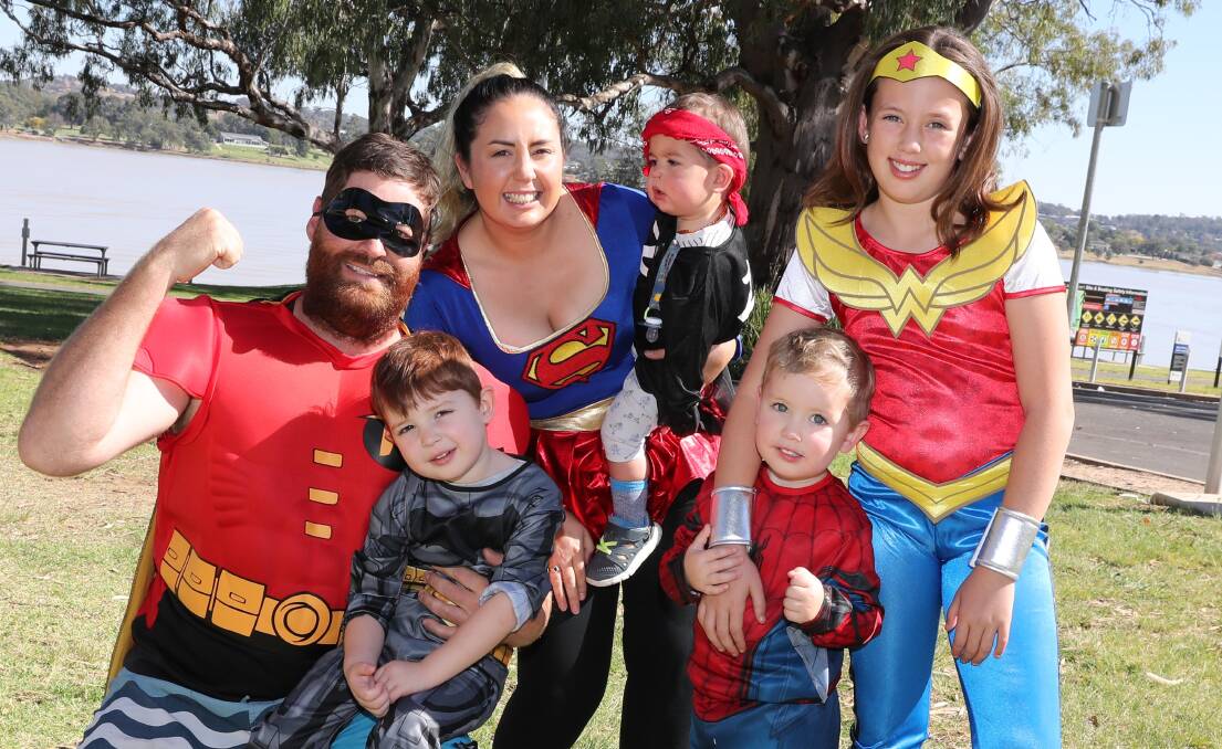 The Eldridge clan from Wagga with Greg and Alisia, and kids (L) Coby, 4, Thomas 12 mths, Nicholas, 2 and Mia 10 years at last year's Autism Superhero Walk. Picture: Les Smith