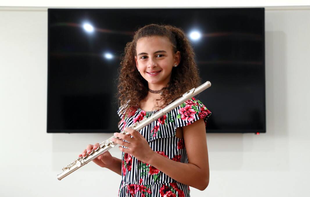 TV STAR: Karin Rezkalla is excited to see herself on television, sharing her knowledge alongside the country's other child geniuses. Picture: Les Smith