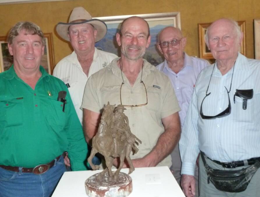 PROUD EFFORT: Pat Leary, Mick Batchelor, Mon Garling, John Ploenges and Reg Hearne are thrilled with the small-scale version of a bronze memorial statue to be installed in Wagga's Victory Memorial Gardens. Picture: Contributed