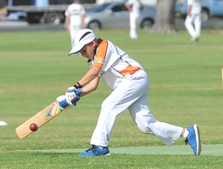 STRIKE ACTION: Talented young batsman Connor McPherson hits his mark during a Wagga junior cricket clash. Picture: Laura Hardwick