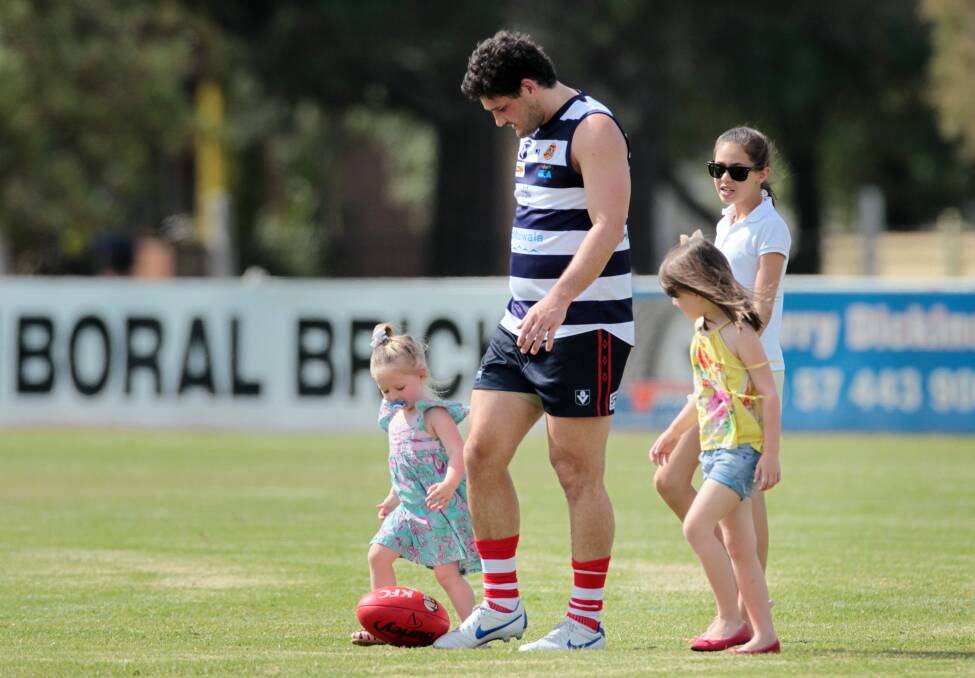 Fevola with his daughters