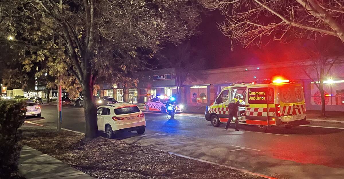 EMERGENCY: Police and paramedics on Wagga's Berry Street after a woman was hit by a vehicle on Thursday evening. Picture: Madeline Begley