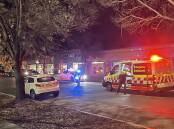 EMERGENCY: Police and paramedics on Wagga's Berry Street after a woman was hit by a vehicle on Thursday evening. Picture: Madeline Begley
