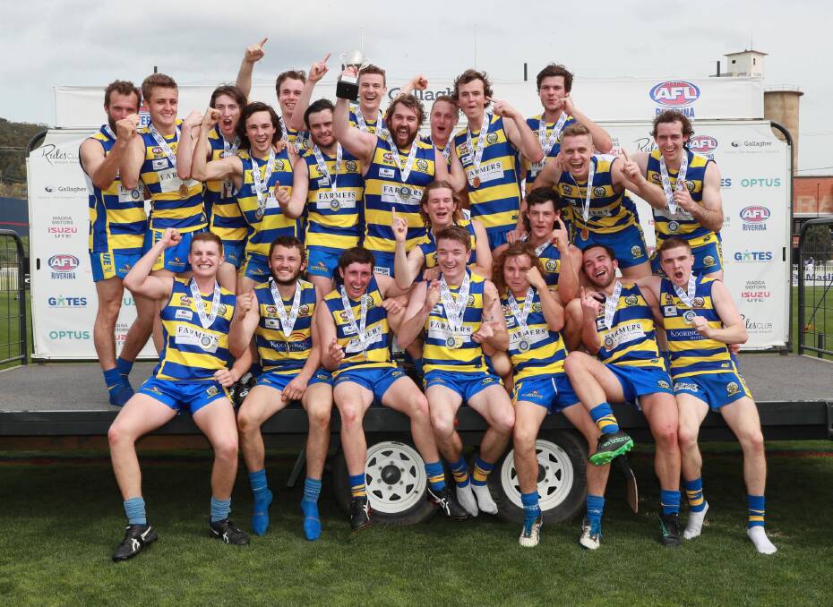 Mangoplah-Cookardinia United-Eastlakes celebrate their reserve grade premiership win at Robertson Oval on Saturday. Picture: Les Smith