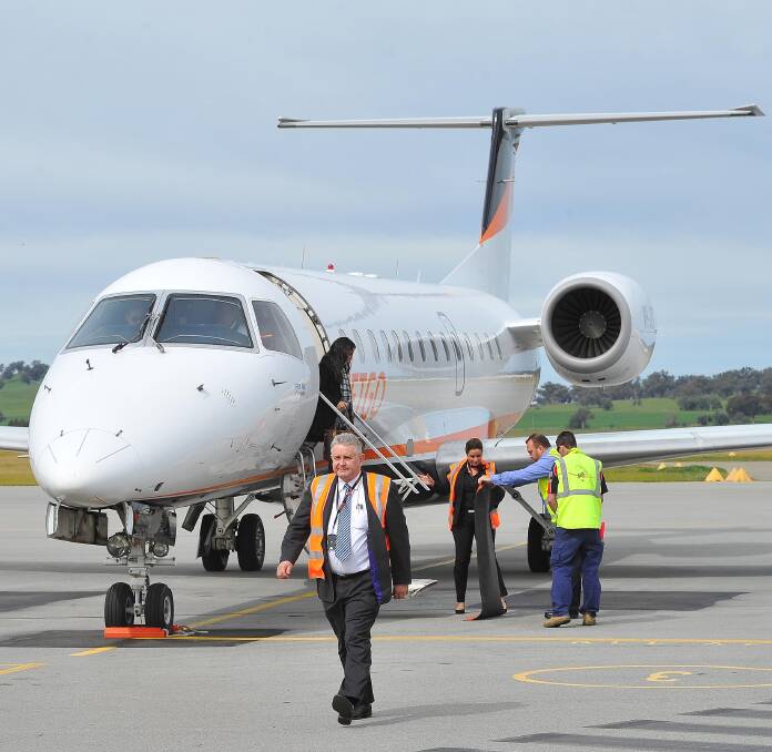 JetGo's managing director Paul Bredereck steps off the plane at Wagga Airport in 2016. Picture: Kieren L. Tilly