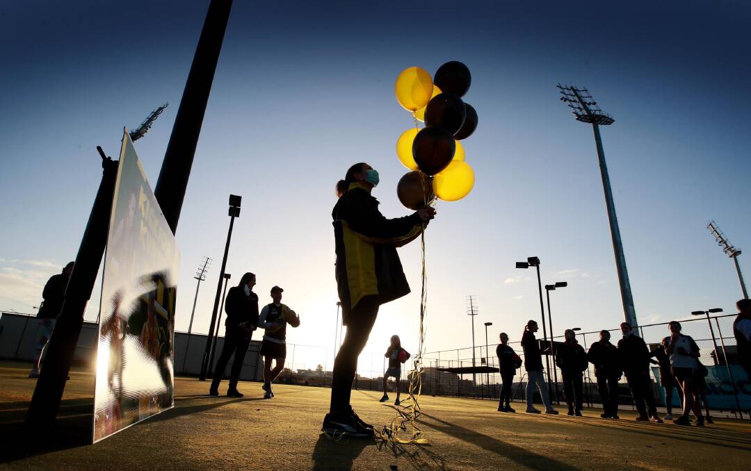 Balloons are released during the Kick for Kurtis tribute event in Wagga on Thursday. Picture: Les Smith
