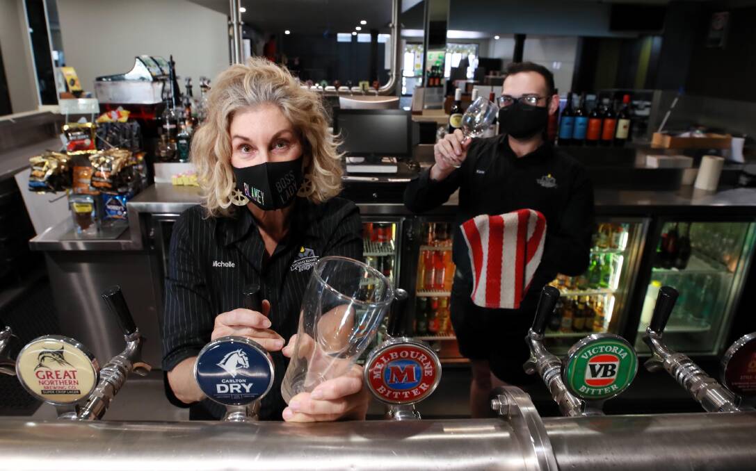 READY TO OPEN: Thomas Blamey Tavern manager Michelle Staunton and staff member Kane Salamon on Wednesday. The pub has a plan in place to bring staff back and open when the lockdown is lifted on Saturday. Picture: Les Smith