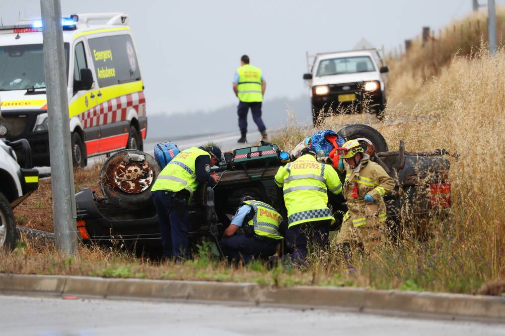 Emergency services at the scene of the crash at the Byrnes Road and East Bomen Road roundabout on October 26, 2020. Picture: Emma Hillier