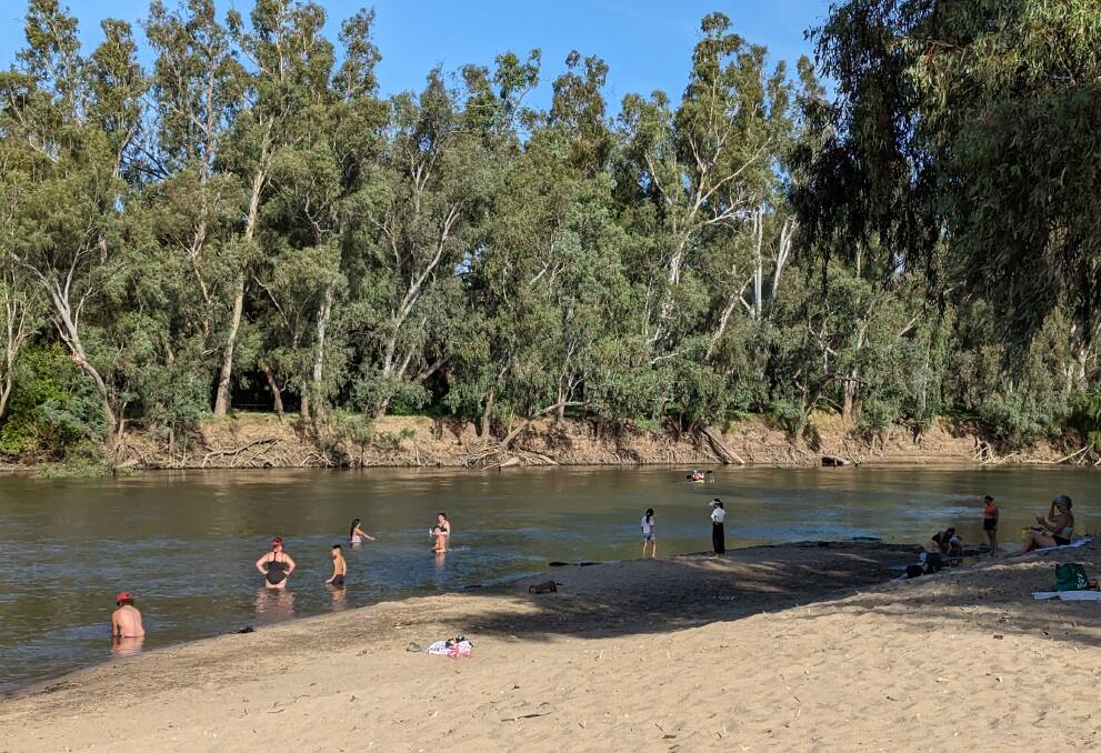 Wagga Beach was the place to be as the mercury hit 39.9 degrees on Sunday, breaking the record for the city's hottest March day. Picture by Dan Holmes