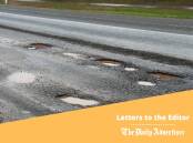 One letter-writer is wondering if Wagga City Council has stumbled over an new way to slow drivers down at intersections - potholes. File picture