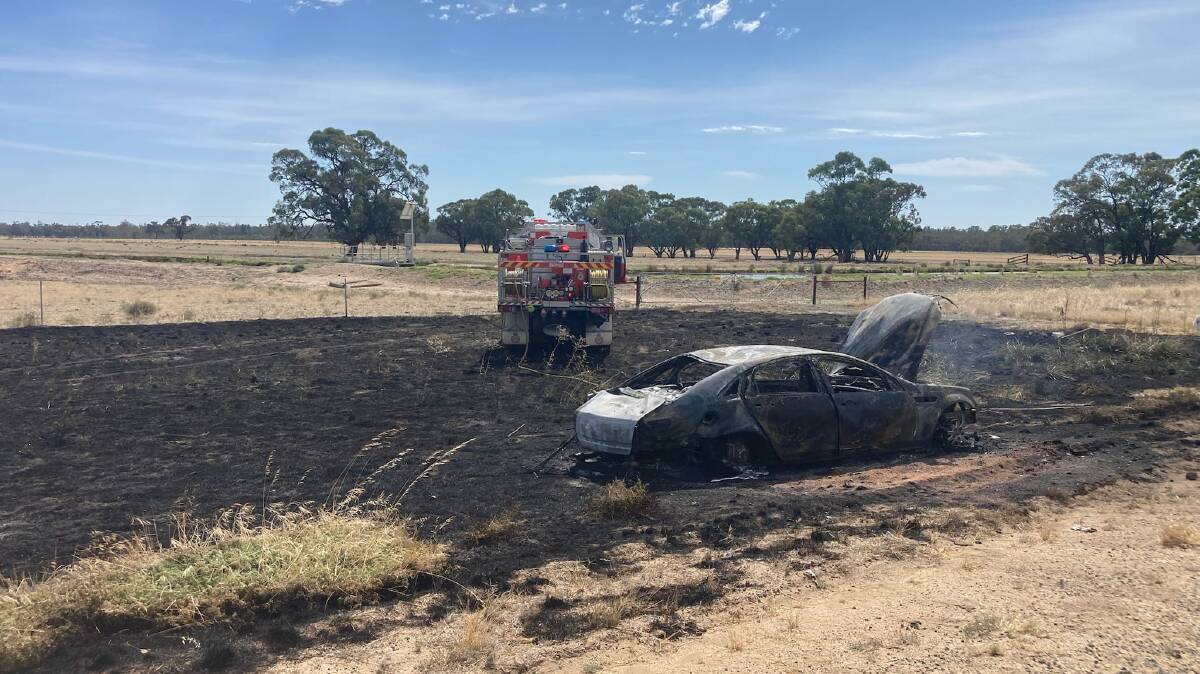 A NSW Rural Fire Service crew at the scene of a vehicle fire on the Deniliquin/Barham Rd on Wednesday morning. Although the vehicle was destroyed, firefighters did prevent the fire spreading across nearby paddocks. Picture: NSW RFS - Mid Murray Zone