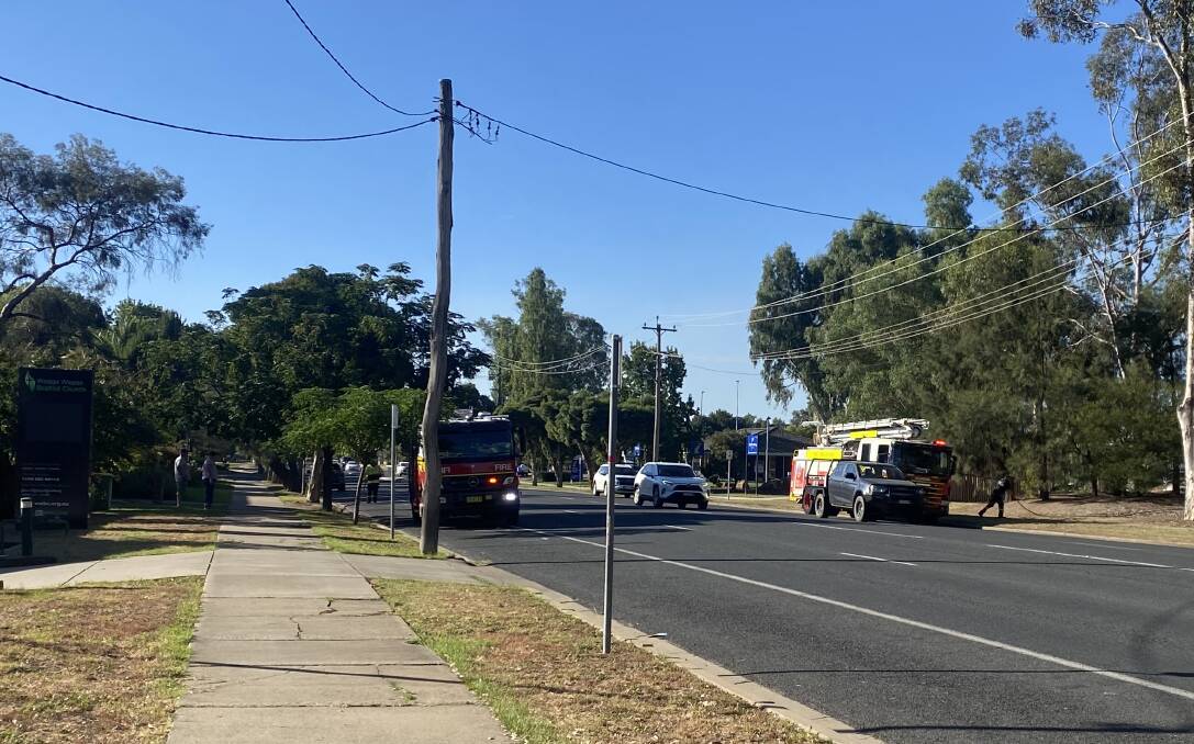 Fire and Rescue NSW crews tackle fires on both sides of Tarcutta Street - a bin fire at the Wagga Baptist Church and a fire on the riverbank near the city's visitor information centre - about 5.30pm on March 4. Picture by Andrew Pearson
