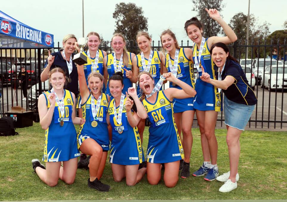 Mangoplah-Cookardinia United-Eastlakes celebrate their grand final win at Robertson Oval on Saturday. Picture: Les Smith